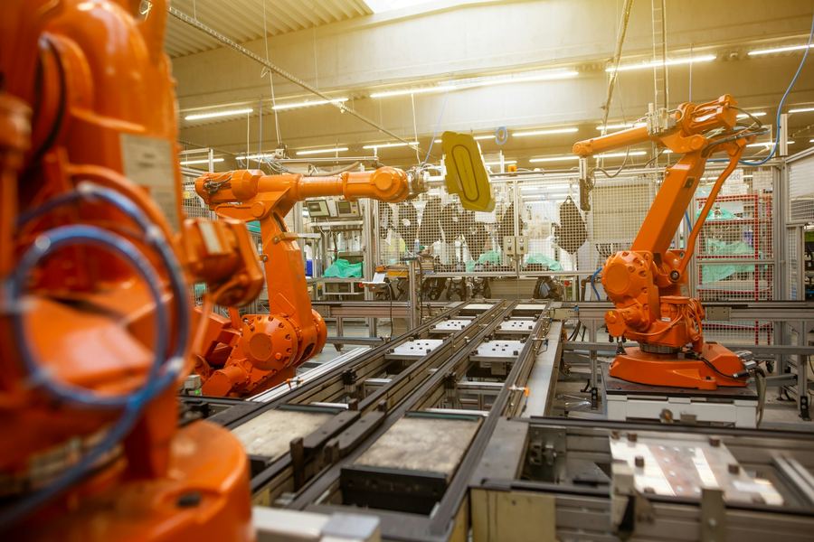 Industrial robots on an automotive production line